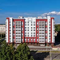 Наугорское шоссе, 62 - 9-этажный кирпичный жилой дом с офисными помещениями. Построен в 2020 г.